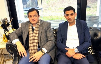 A couple of men sitting on a couch

AI-generated content may be incorrect.