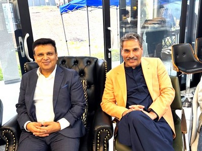 Two men sitting in chairs

AI-generated content may be incorrect.