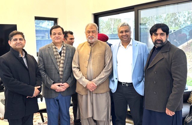 A group of men standing together

AI-generated content may be incorrect.