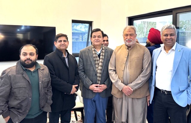 A group of men standing together

AI-generated content may be incorrect.