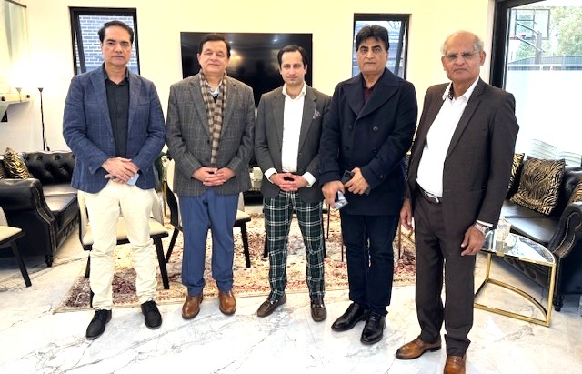 A group of men standing together

AI-generated content may be incorrect.