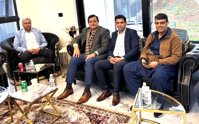 A group of men sitting on a couch

AI-generated content may be incorrect.