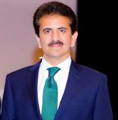 A person in a suit and tie

AI-generated content may be incorrect.