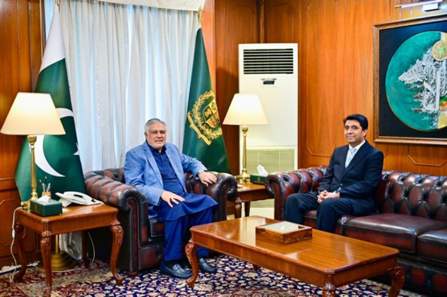 A group of men sitting in chairs in a room with flags

AI-generated content may be incorrect.