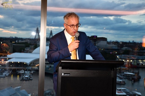 A person speaking into a microphone

AI-generated content may be incorrect.