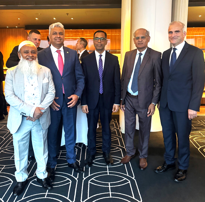 A group of men in suits

AI-generated content may be incorrect.