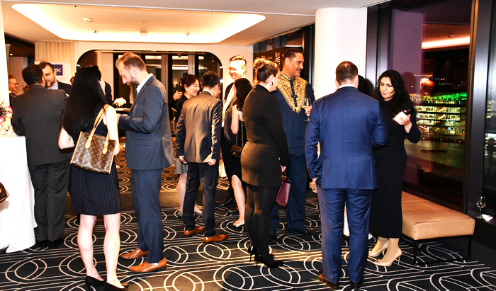 A group of people in a room

AI-generated content may be incorrect.