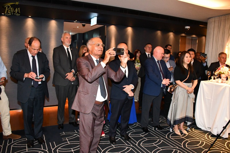 A group of people in suits taking a picture

AI-generated content may be incorrect.