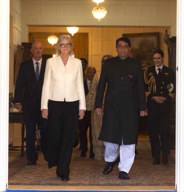 A group of people walking in a doorway

AI-generated content may be incorrect.