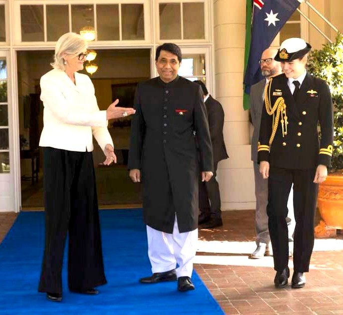 A person in a black dress and a person in a white jacket

AI-generated content may be incorrect.