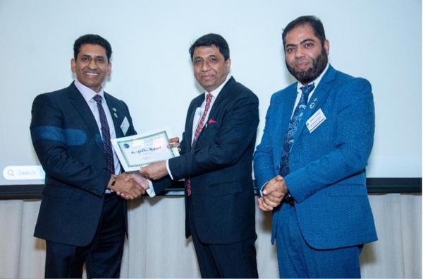 A group of men shaking hands

AI-generated content may be incorrect.