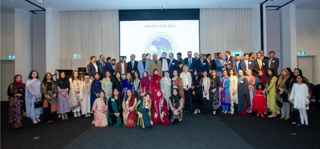 A group of people posing for a photo

AI-generated content may be incorrect.