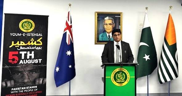 A person standing at a podium with flags

AI-generated content may be incorrect.