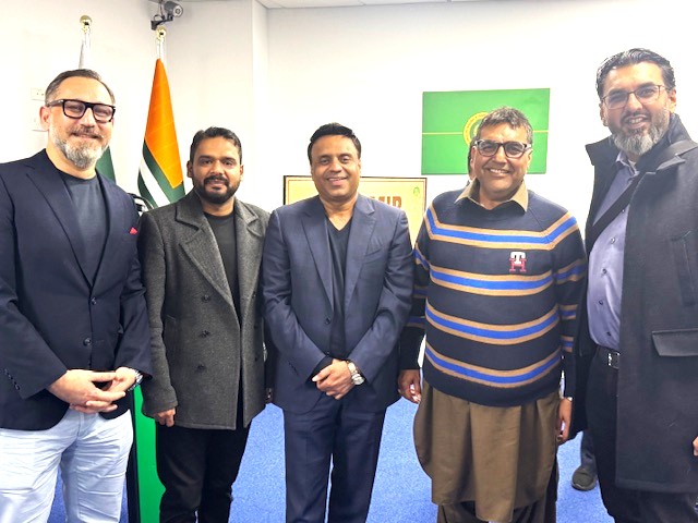 A group of men standing together

AI-generated content may be incorrect.