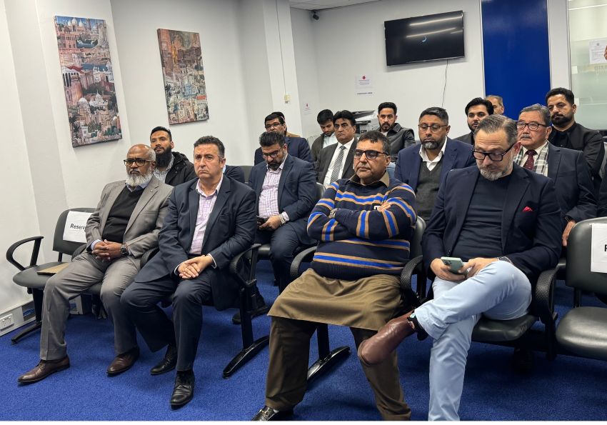 A group of men sitting in chairs

AI-generated content may be incorrect.