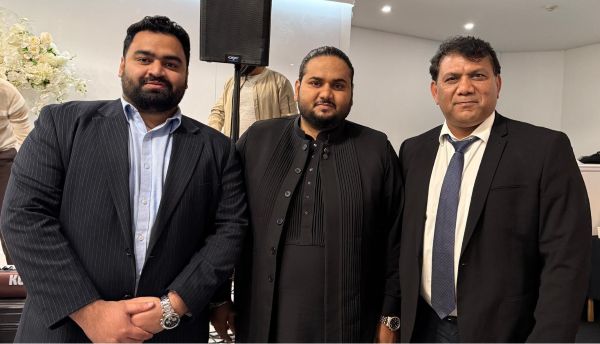 A group of men standing together

AI-generated content may be incorrect.