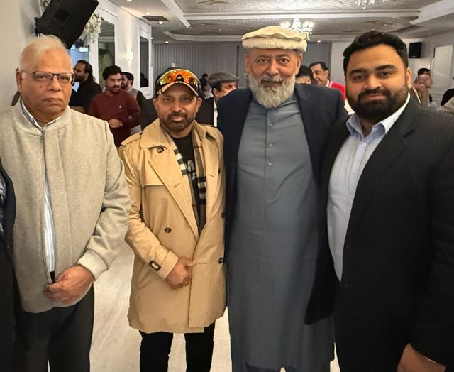 A group of men standing together

AI-generated content may be incorrect.