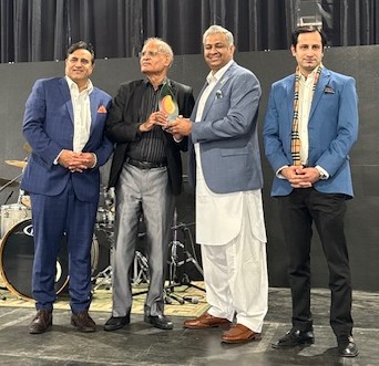 A group of men standing together

AI-generated content may be incorrect.