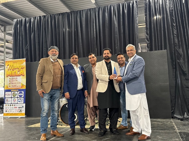 A group of men standing together

AI-generated content may be incorrect.