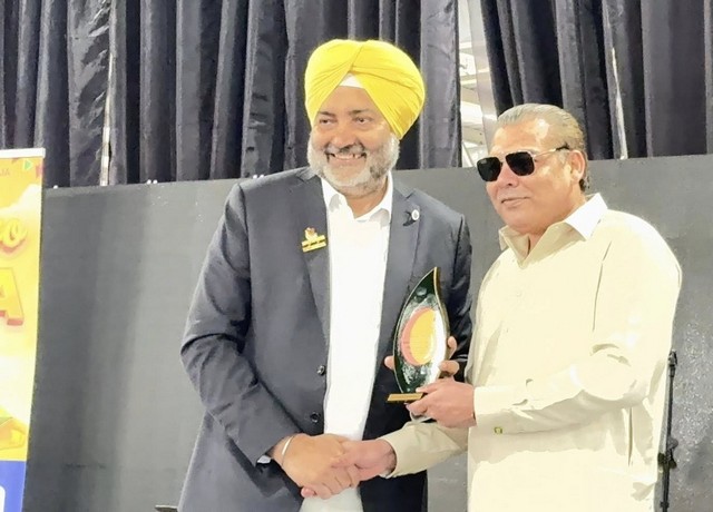 A person holding a trophy

AI-generated content may be incorrect.