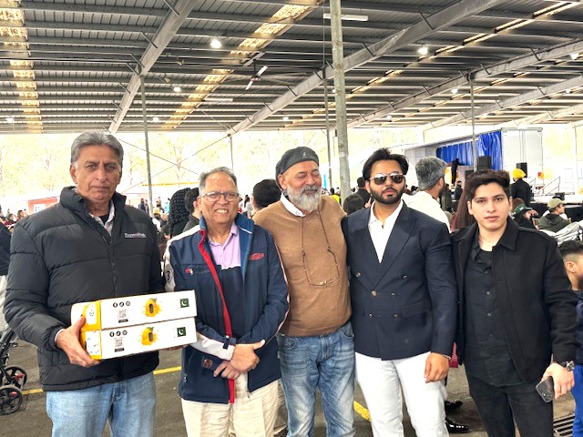 A group of men standing together

AI-generated content may be incorrect.