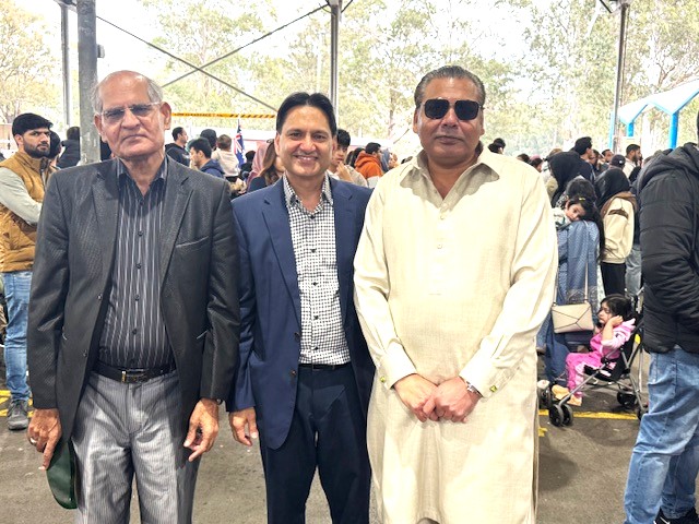 A group of men standing together

AI-generated content may be incorrect.