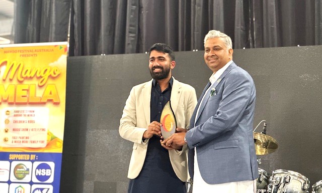 A person holding a trophy

AI-generated content may be incorrect.