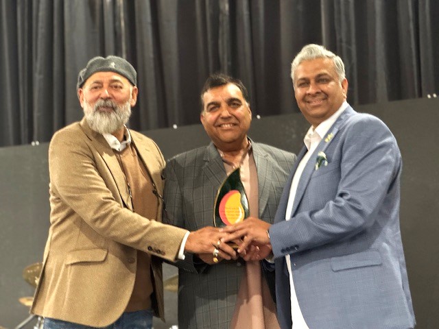 A group of men posing for a photo

AI-generated content may be incorrect.