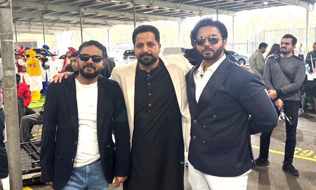 A group of men standing together

AI-generated content may be incorrect.