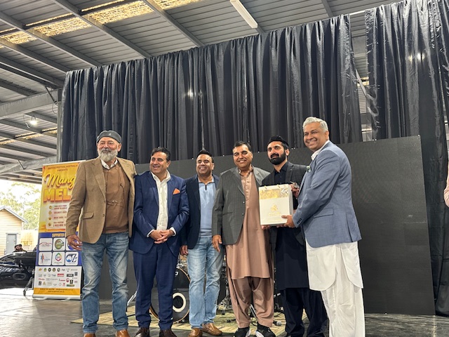 A group of men standing in front of a black curtain

AI-generated content may be incorrect.