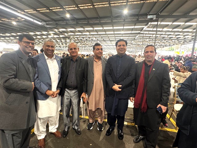 A group of men standing together

AI-generated content may be incorrect.