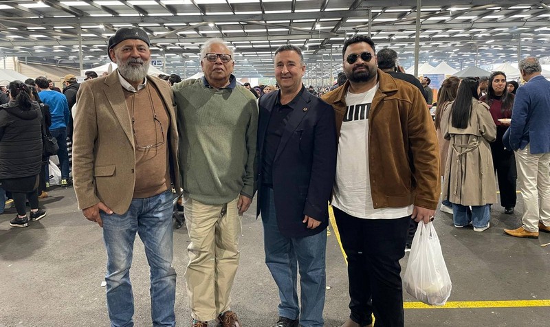 A group of men standing together

AI-generated content may be incorrect.