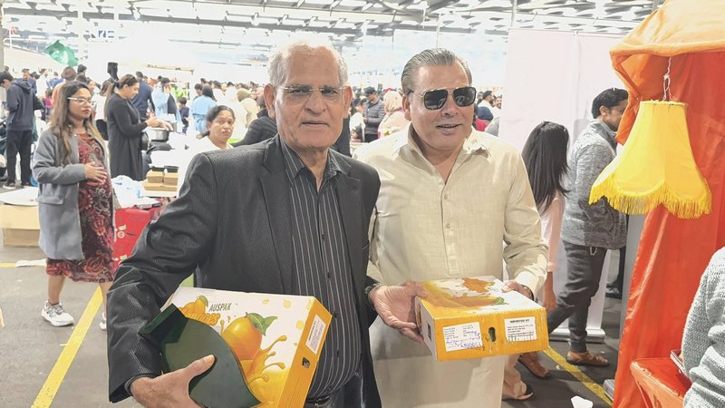 A group of men holding boxes

AI-generated content may be incorrect.