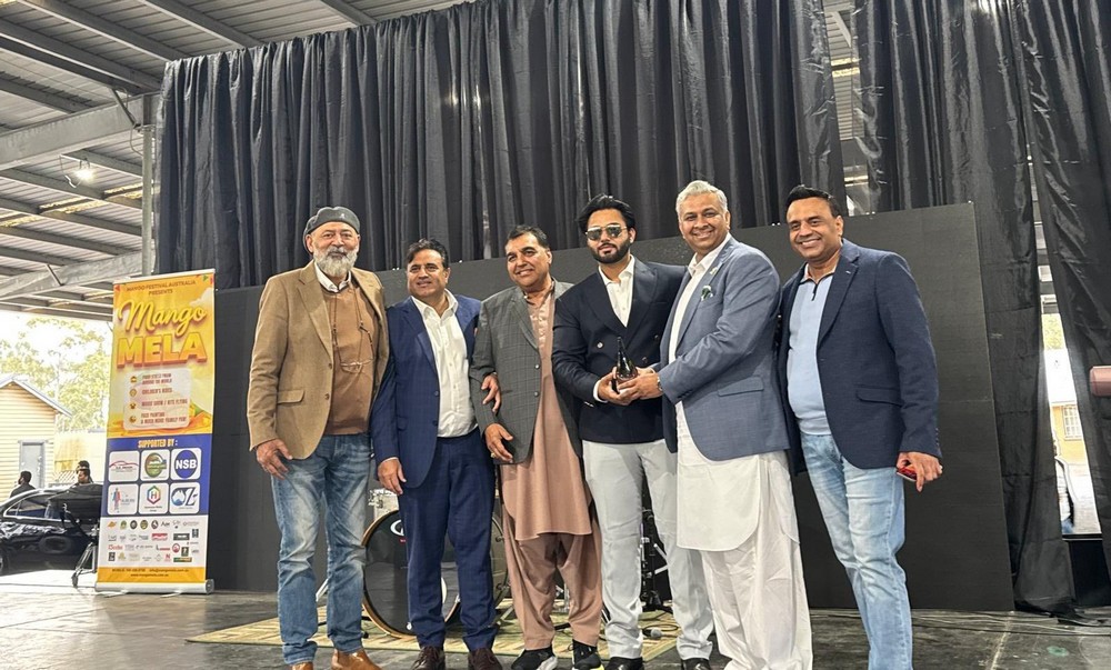 A group of men standing together

AI-generated content may be incorrect.