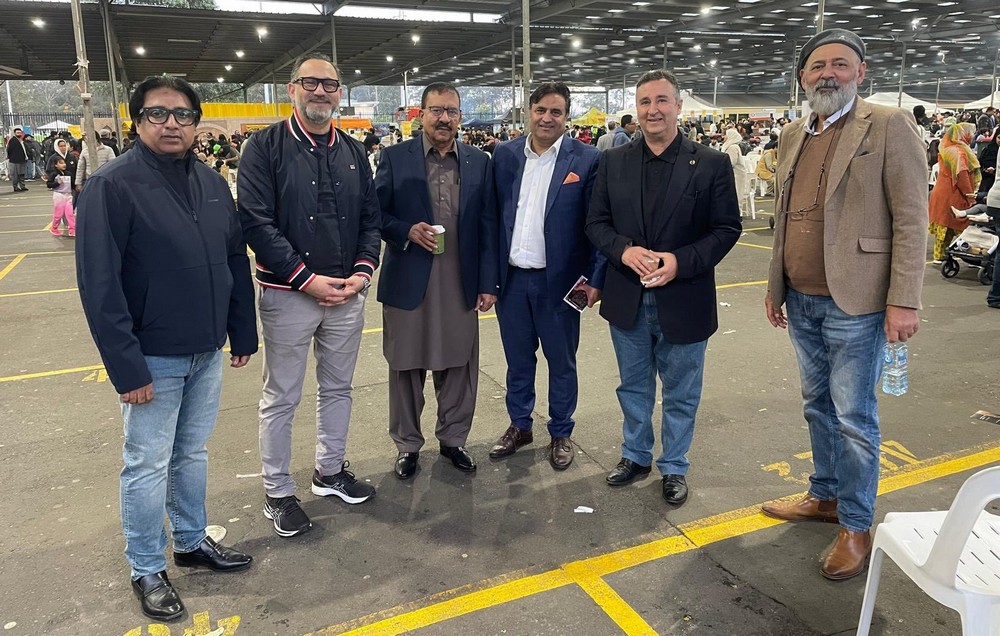 A group of men standing together

AI-generated content may be incorrect.