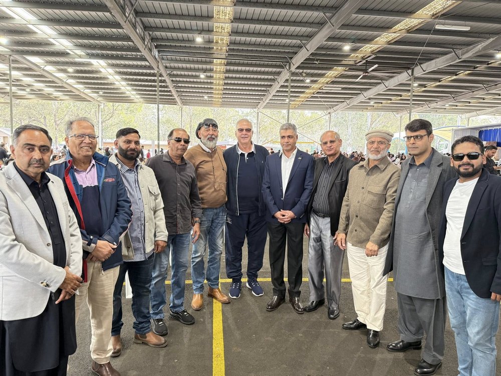 A group of men standing together

AI-generated content may be incorrect.