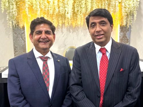 Two men in suits and ties

AI-generated content may be incorrect.