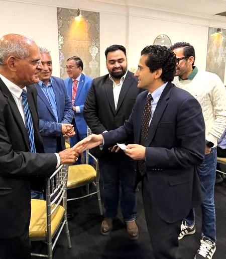 A group of men shaking hands

AI-generated content may be incorrect.