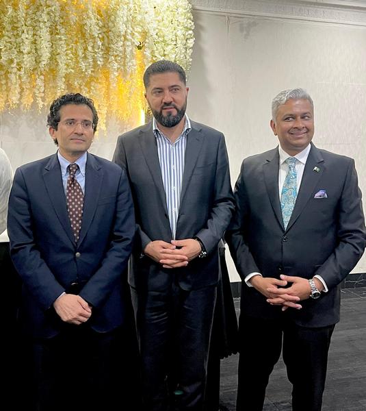 A group of men standing together

AI-generated content may be incorrect.