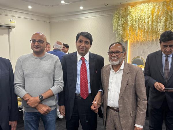 A group of men standing together

AI-generated content may be incorrect.