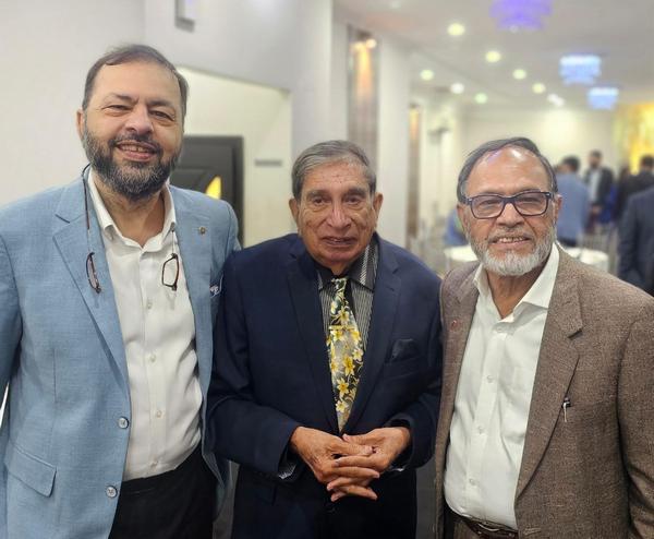 A group of men standing together

AI-generated content may be incorrect.