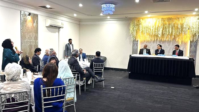 A group of people sitting in chairs in a room

AI-generated content may be incorrect.