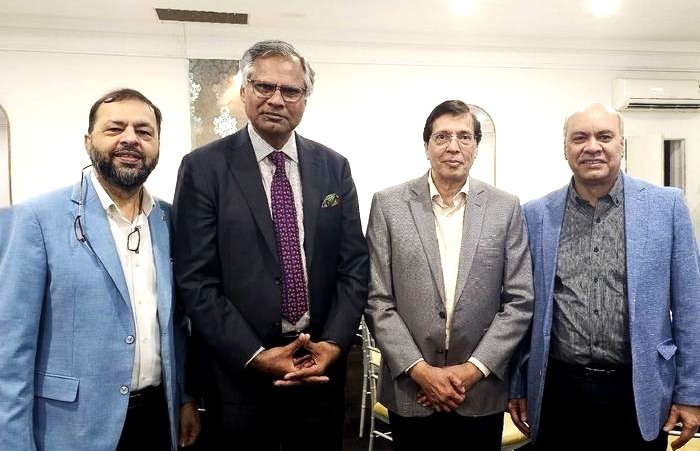 A group of men standing together

AI-generated content may be incorrect.