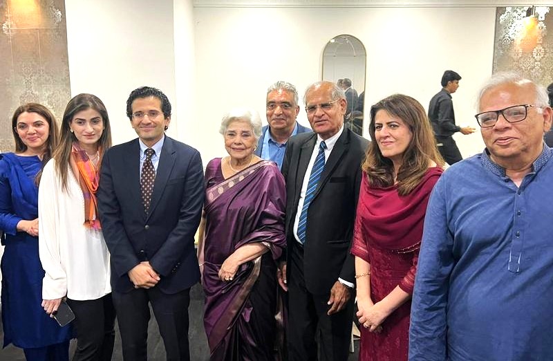 A group of people posing for a photo

AI-generated content may be incorrect.