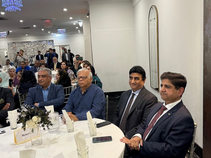 A group of men sitting at a round table

AI-generated content may be incorrect.