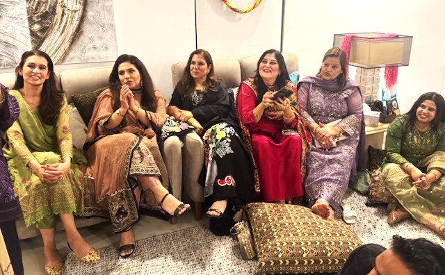A group of women sitting on couches

AI-generated content may be incorrect.