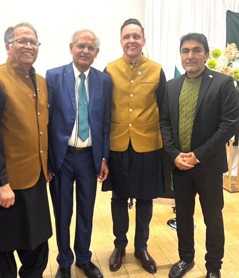 A group of men standing together

AI-generated content may be incorrect.