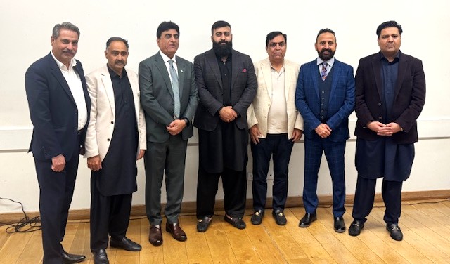 A group of men standing together

AI-generated content may be incorrect.