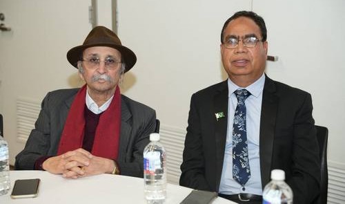 A couple of men sitting at a table

AI-generated content may be incorrect.