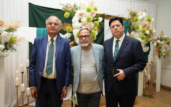 A group of men standing in front of a floral backdrop

AI-generated content may be incorrect.